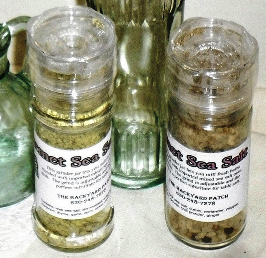 Gourmet Salt Herbed Dry Salt Cooking Blend, in a grinder jar
